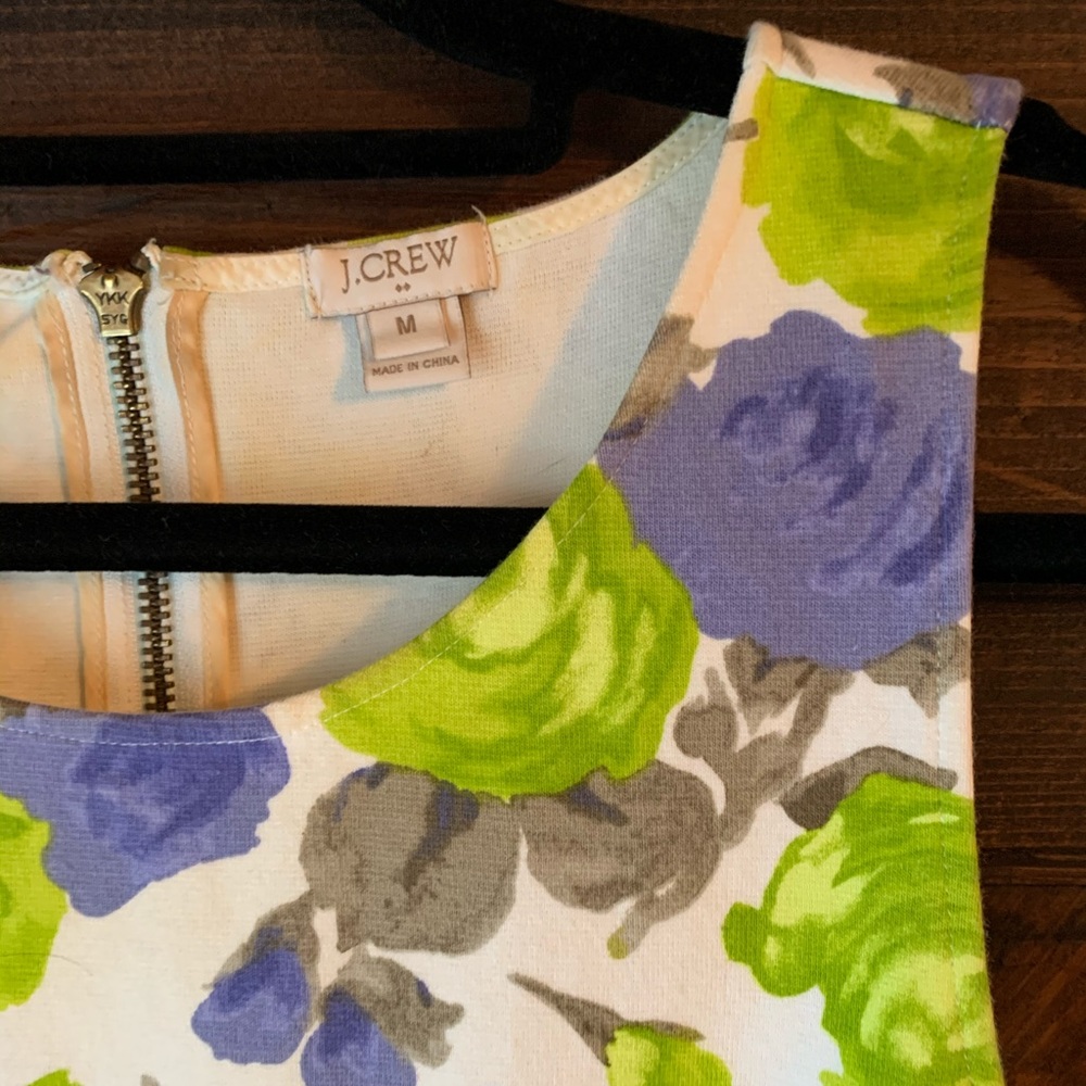 Floral peplum sleeveless top